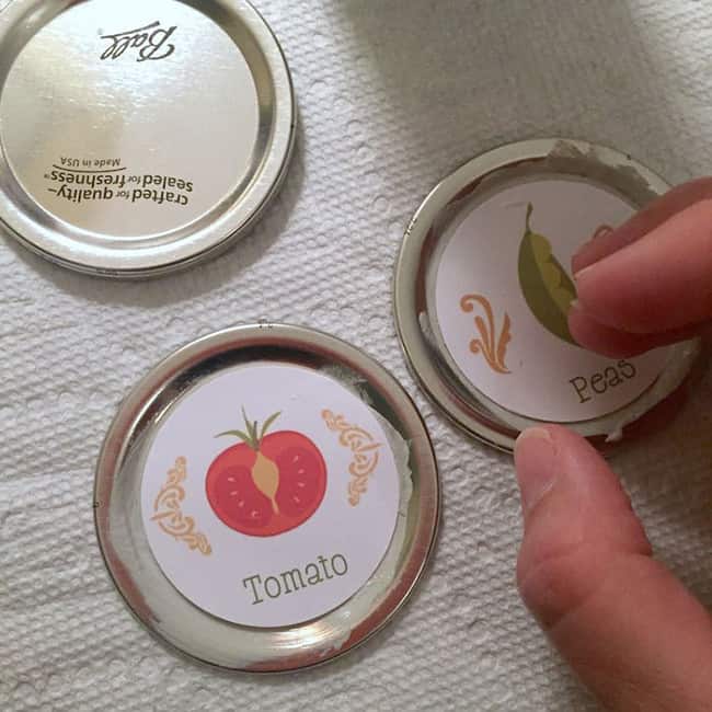Apply labels to the tops of the lids and smooth