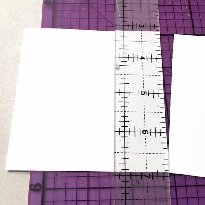 Separating pieces of paper that have been cut by a craft knife