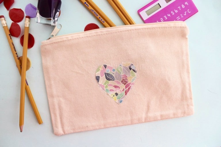 Decorate a bag with your favorite scrapbook paper AND make it washable using this image transfer technique! It's easy with Mod Podge Photo Transfer Medium.