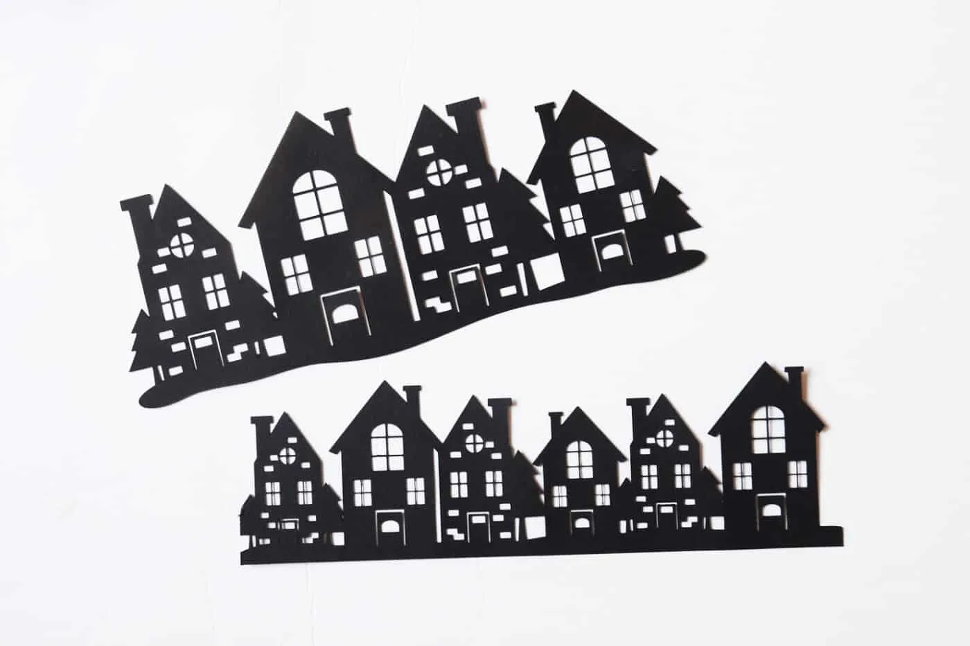 Silhouette house border cut out from black paper