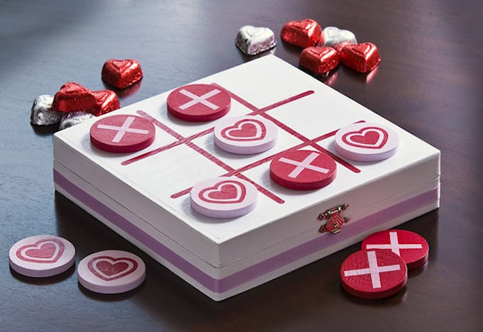 This cute Valentine's Day tic tac toe game was made using a wood box and other supplies from the craft store. Makes a great gift!