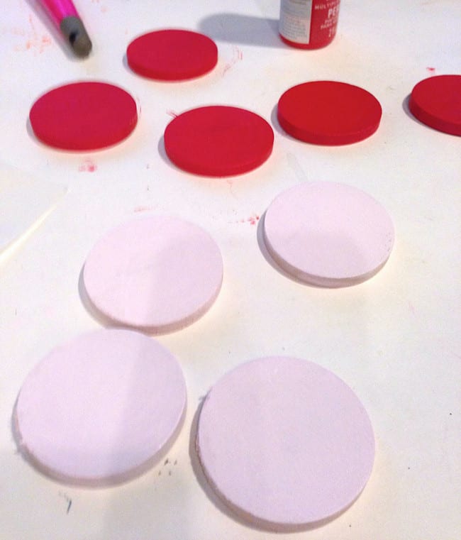 Painted tic tac toe wood circles in red and pink