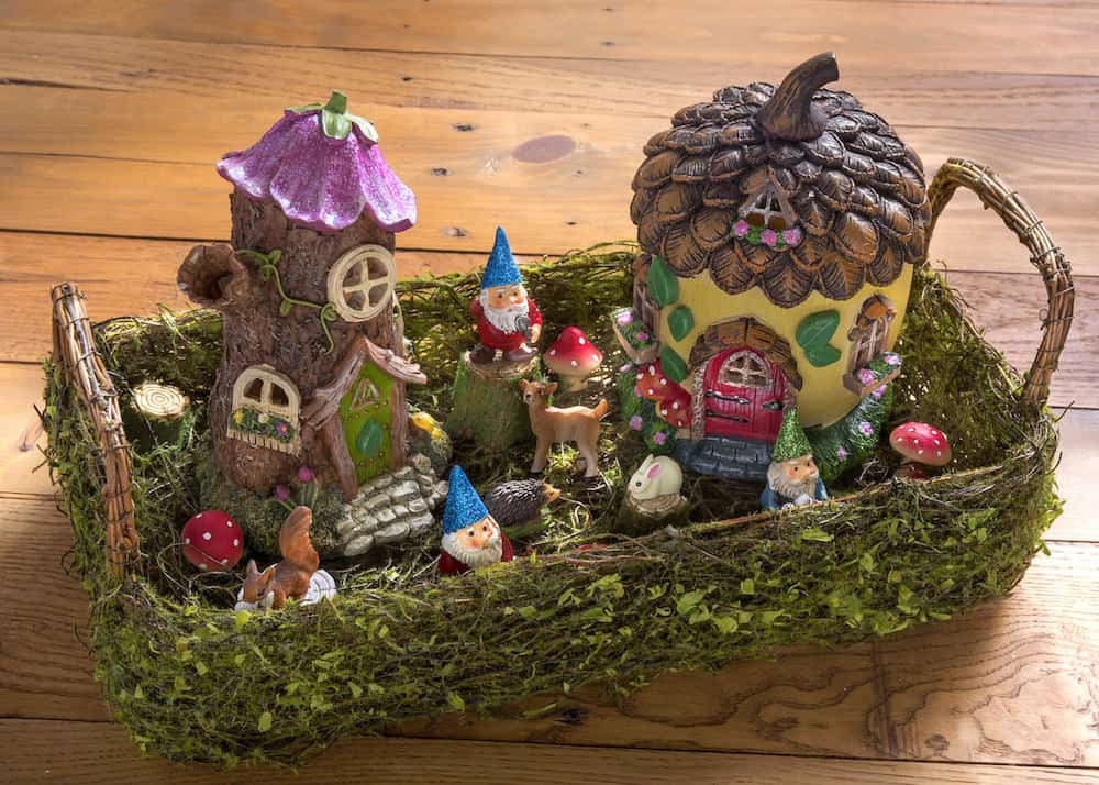 Create a desktop fairy garden with gnomes, woodland animals, and other forest accessories. Customize with glitter and Mod Melts!