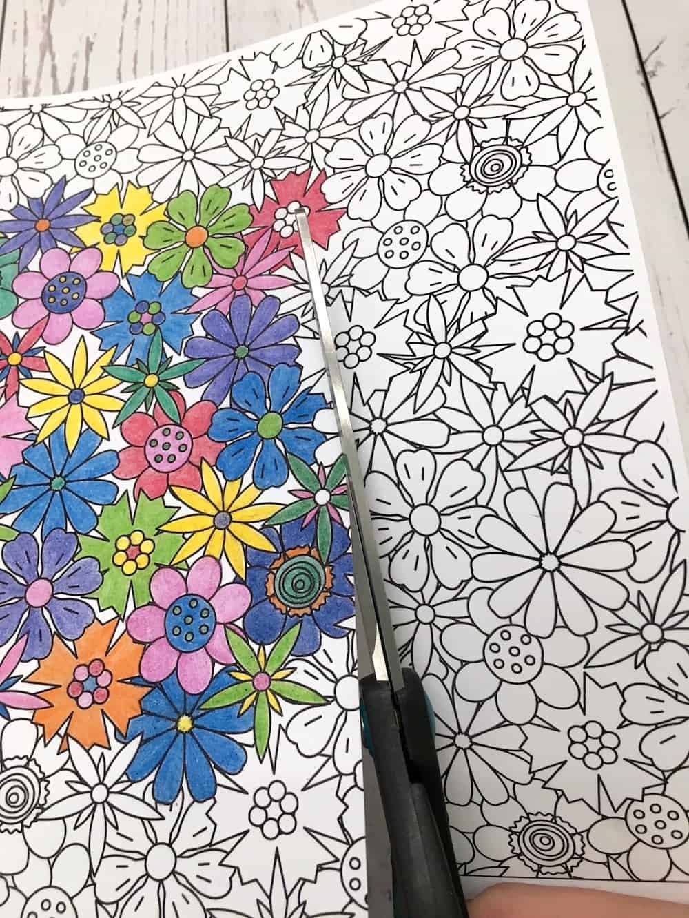 Cutting out the coloring page with scissors