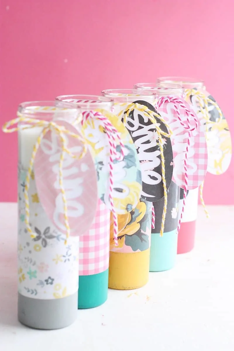 These paper-wrapped and paint-dipped candles use the power of Mod Podge to bring some springy life to some boring, dollar store candles.