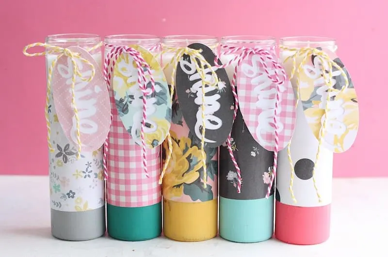 These paper-wrapped and paint-dipped candles use the power of Mod Podge to bring some springy life to some boring, dollar store candles.