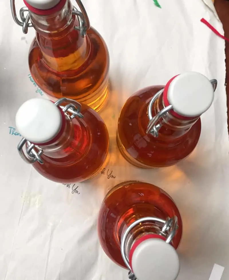 Cider bottles filled with apple cider