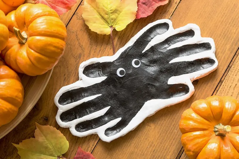 If you're looking for fun and easy Halloween crafts for toddlers, these handprints are perfect! There's a pumpkin, spider, and ghost footprint too.