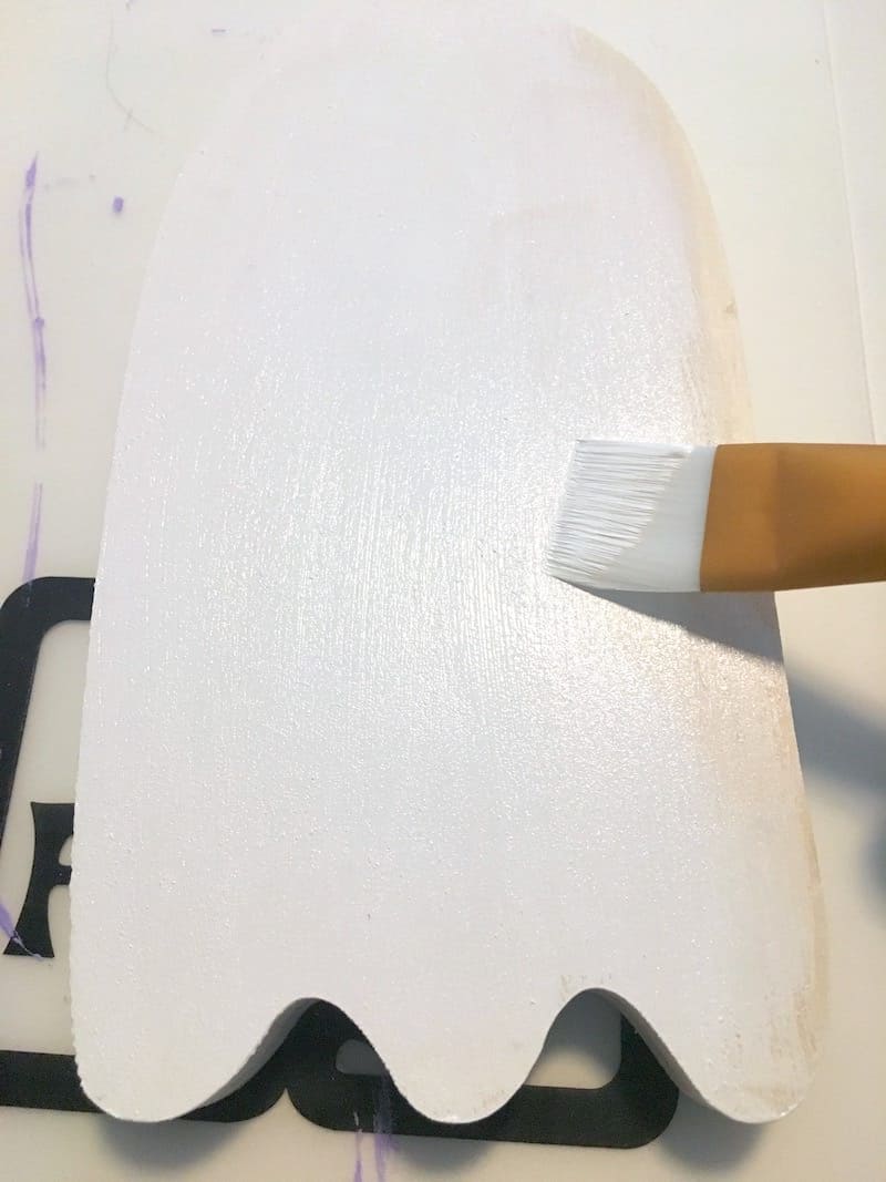 Painting the ghost shape with white craft paint