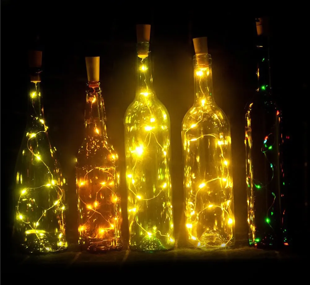 wine bottles with lights in them