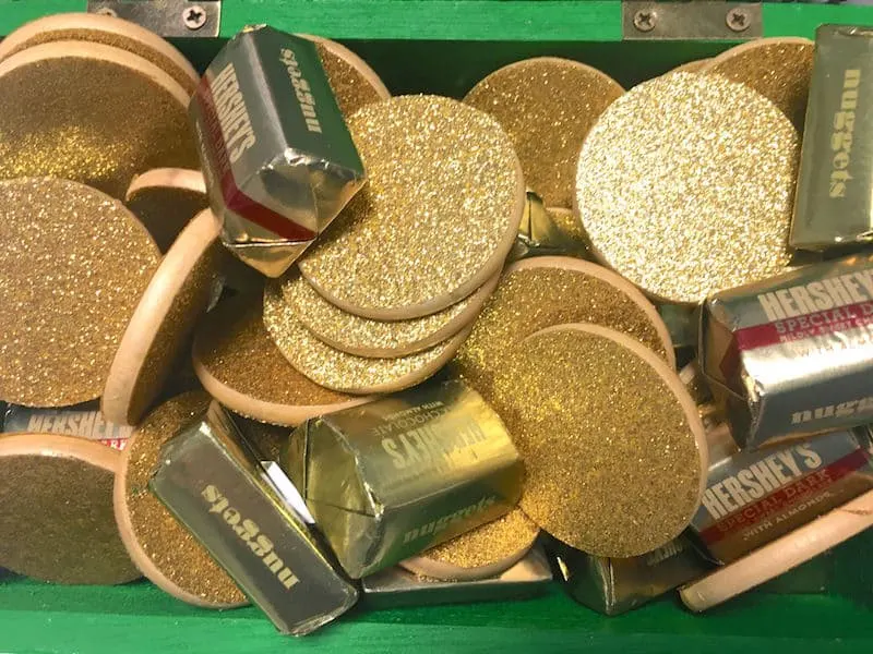 Gold coins with Hershey's nuggets candy in a St. Patrick's Day chest