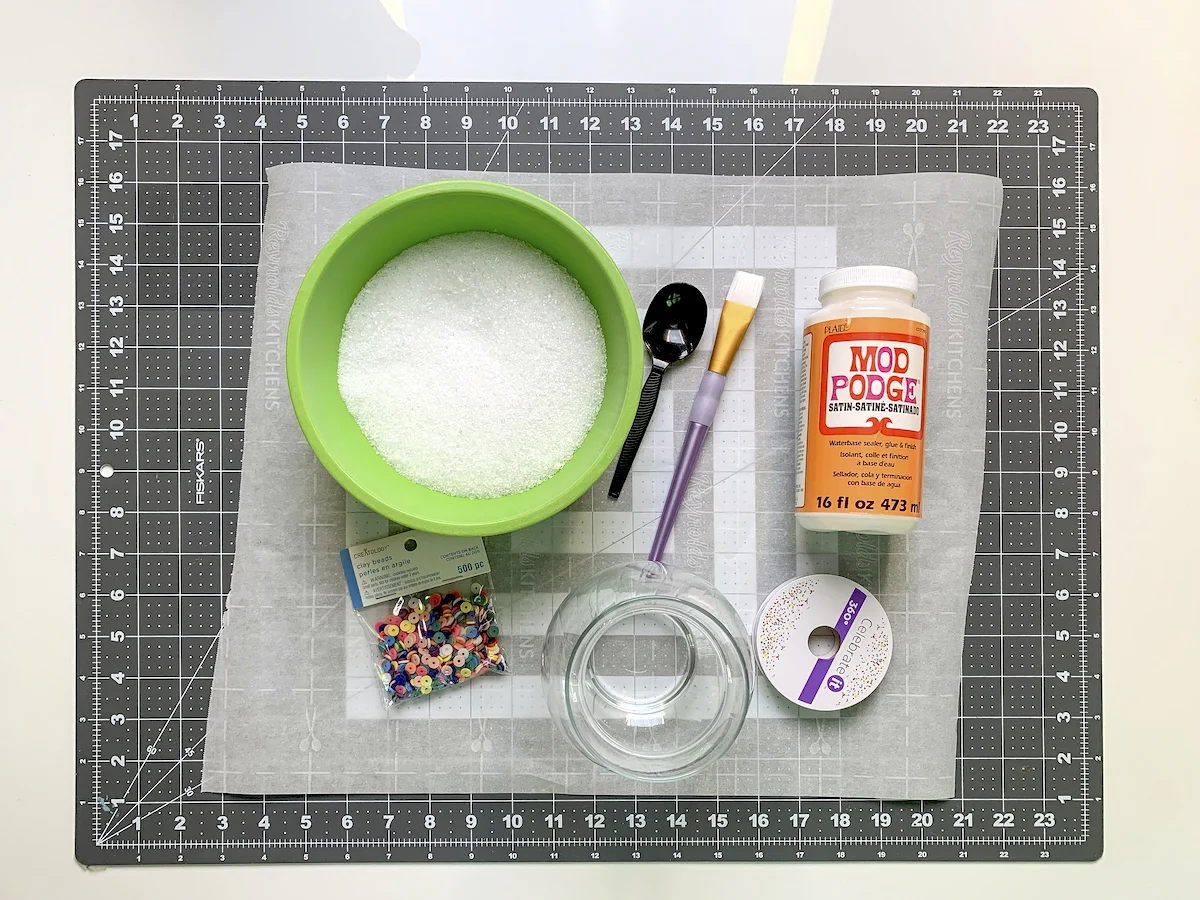 Epsom salt, Mod Podge, spoon, clay buttons, glass jar, ribbon, paintbrush