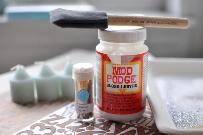 Mod Podge adhesive letters glitter and a paintbrush