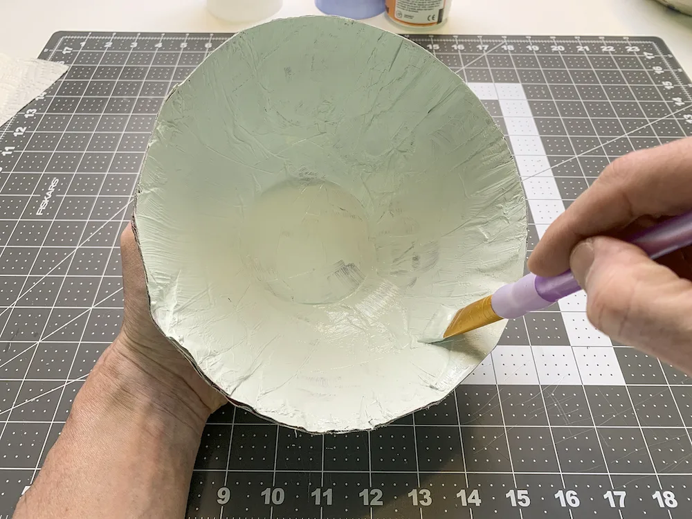 Painting the inside of a Mod Podge paper mache bowl with acrylic paint
