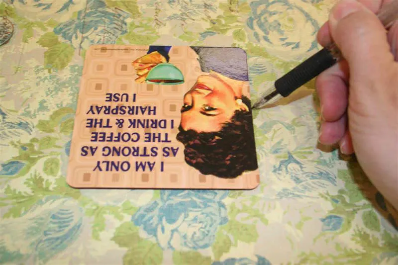 Trace a square onto a piece of scrapbook paper with a pencil