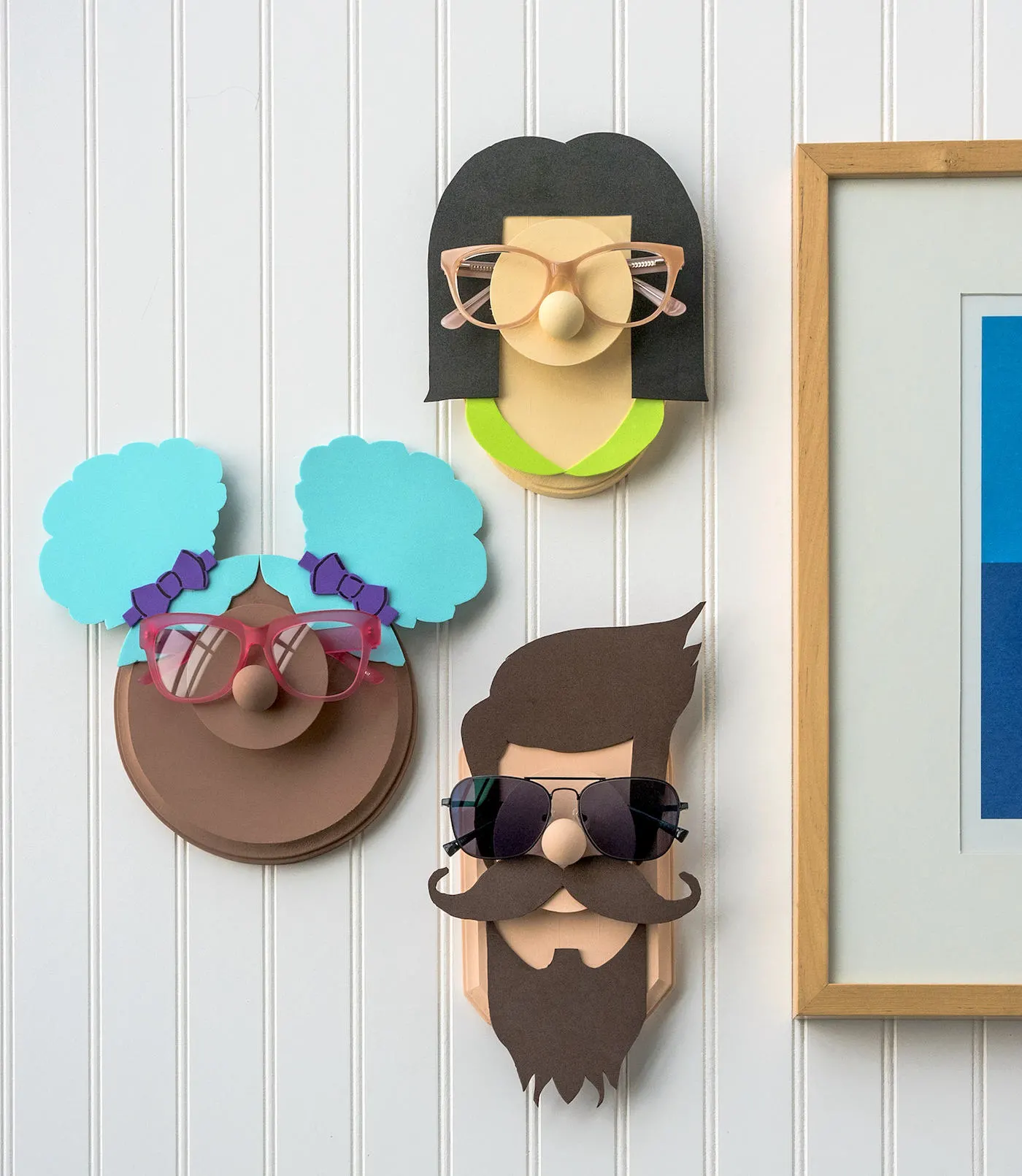 DIY Glasses Holder Display with Fun Faces - Mod Podge Rocks