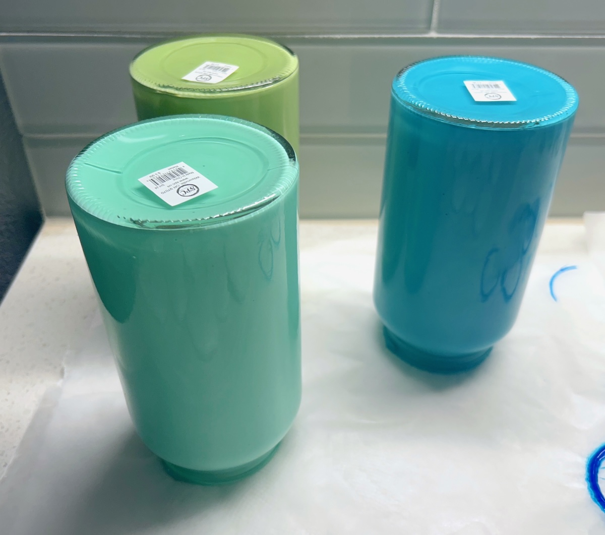 three mason jars drying upside down