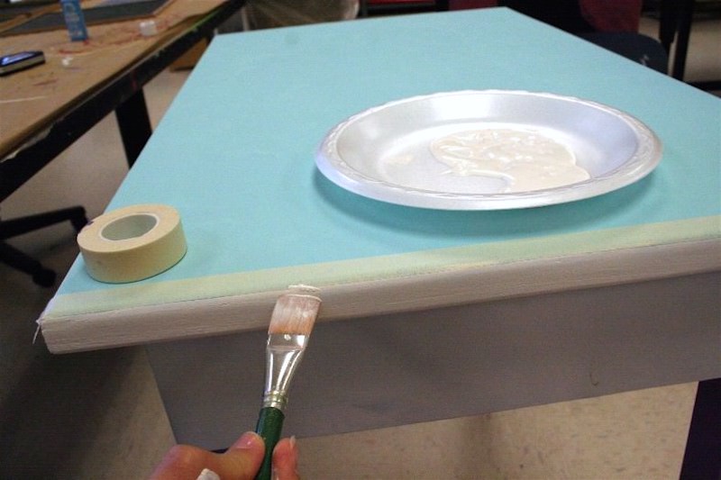 Cleaning up paint on the edge of a decoupage tabletop