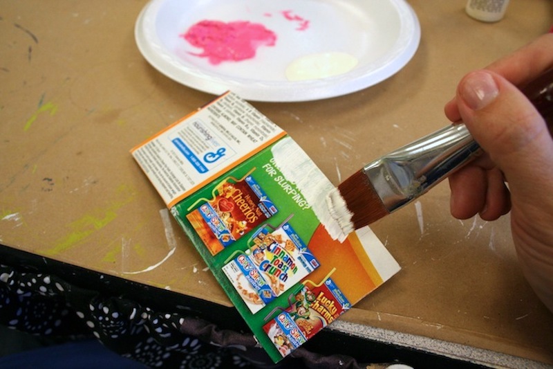 https://modpodgerocksblog.b-cdn.net/wp-content/uploads/2020/07/Painting-the-ends-of-cereal-boxes-with-white-acrylic-paint.jpg