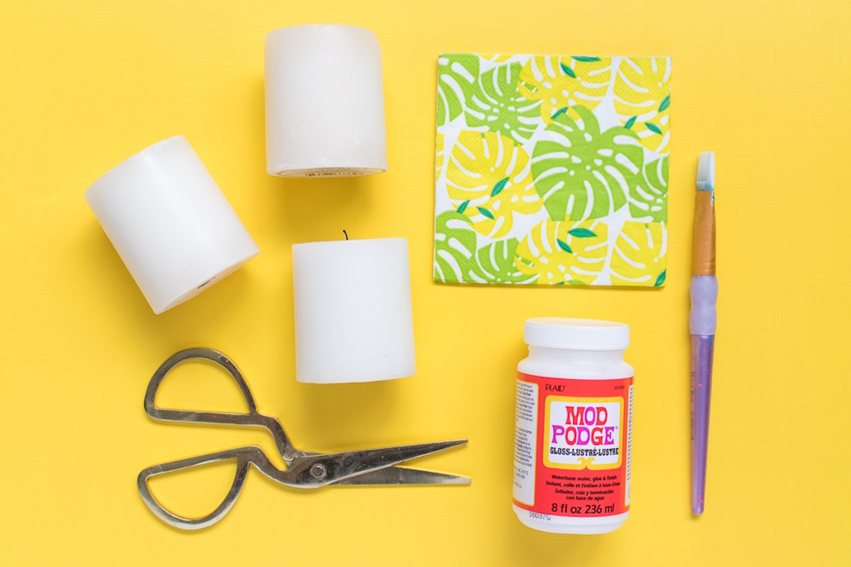 Napkins, Mod Podge, candles, scissors, and a paintbrush