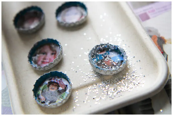 Sprinkle the magnets with glitter