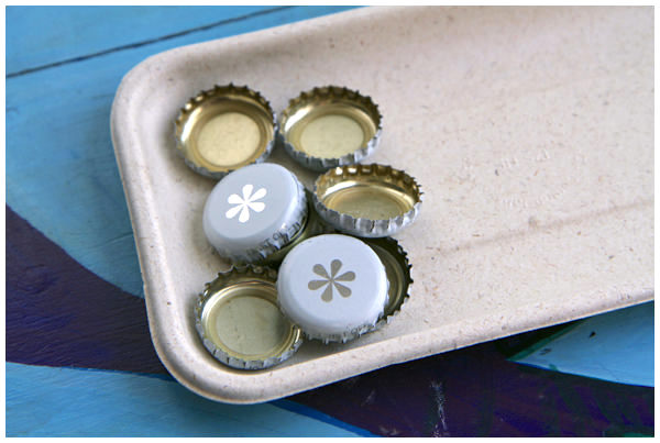 Tray with bottle caps