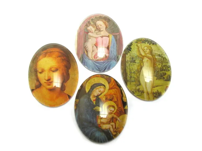 Four Renaissance images with glass cabochons on top