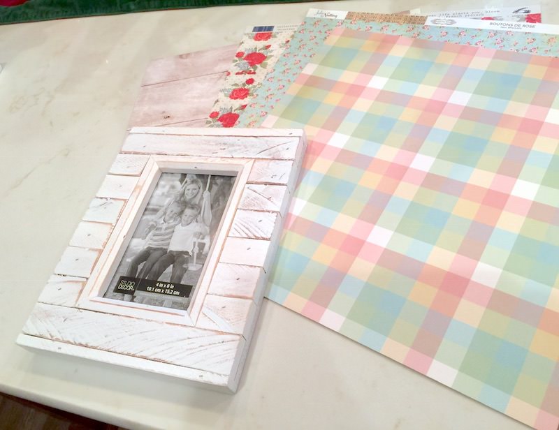 Frame-and-sheets-of-scrapbook-paper