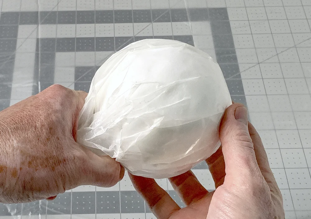 Styrofoam ball covered in wax paper