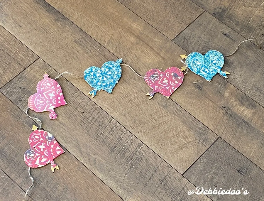 Dollar Tree wood cut out craft idea - heart garland