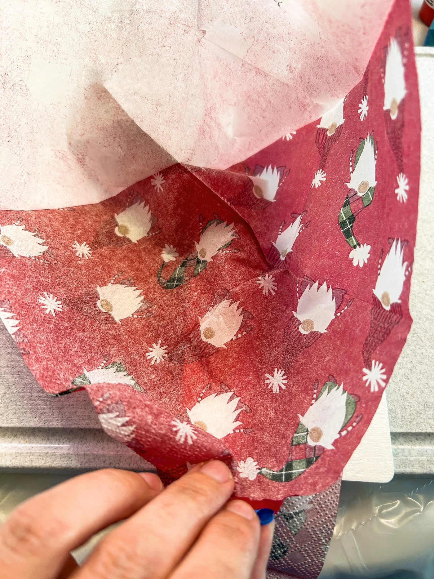 Separating christmas napkin layers with tape
