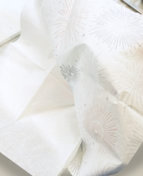 Separating the layers of a fireworks napkin