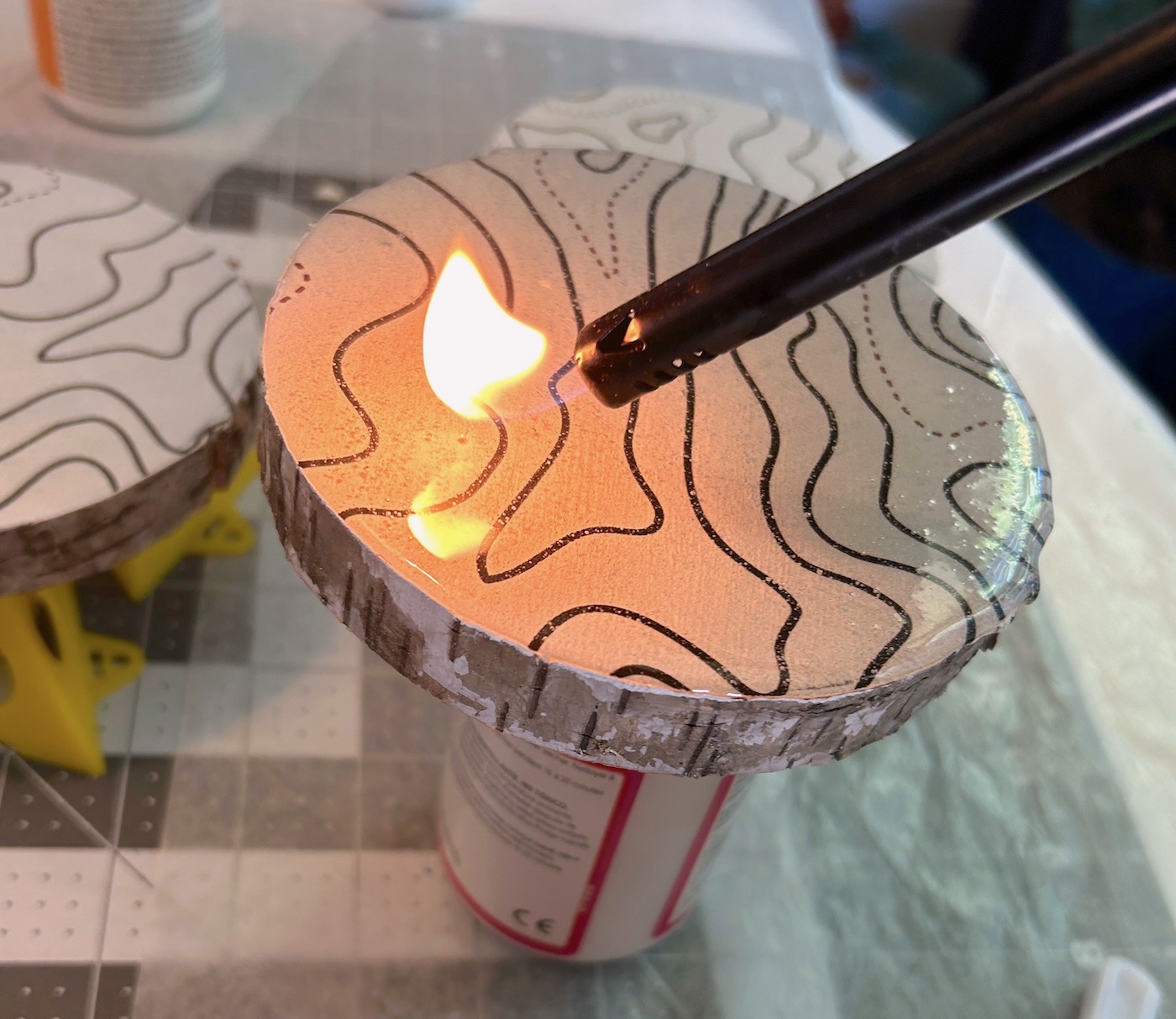 Using a lighter to remove resin bubbles