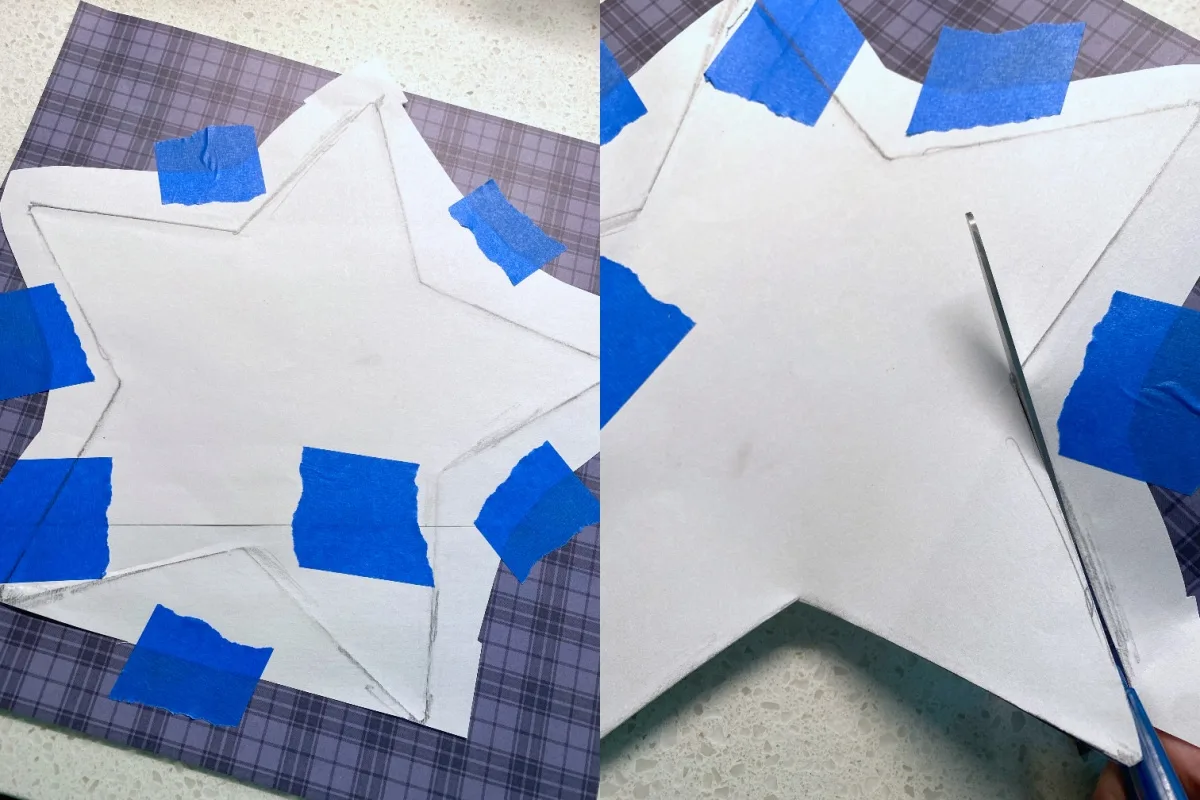 cutting the star shape out of plaid scrapbook paper