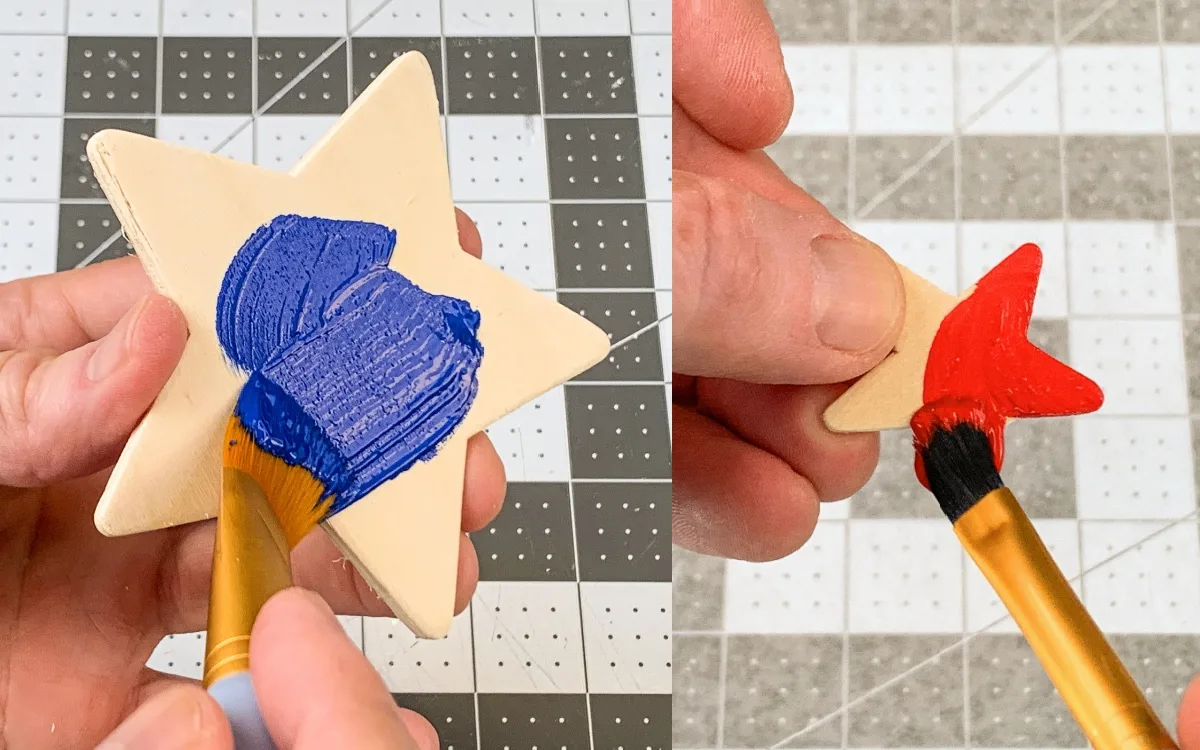 painting wood stars with bright blue and bright red paint