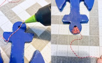 wrapping the red and white baker's twine around the top of the blue anchor and then gluing into place
