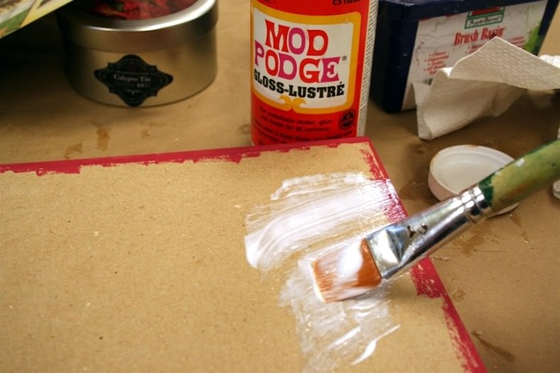 Add Mod Podge to the top of the box lid
