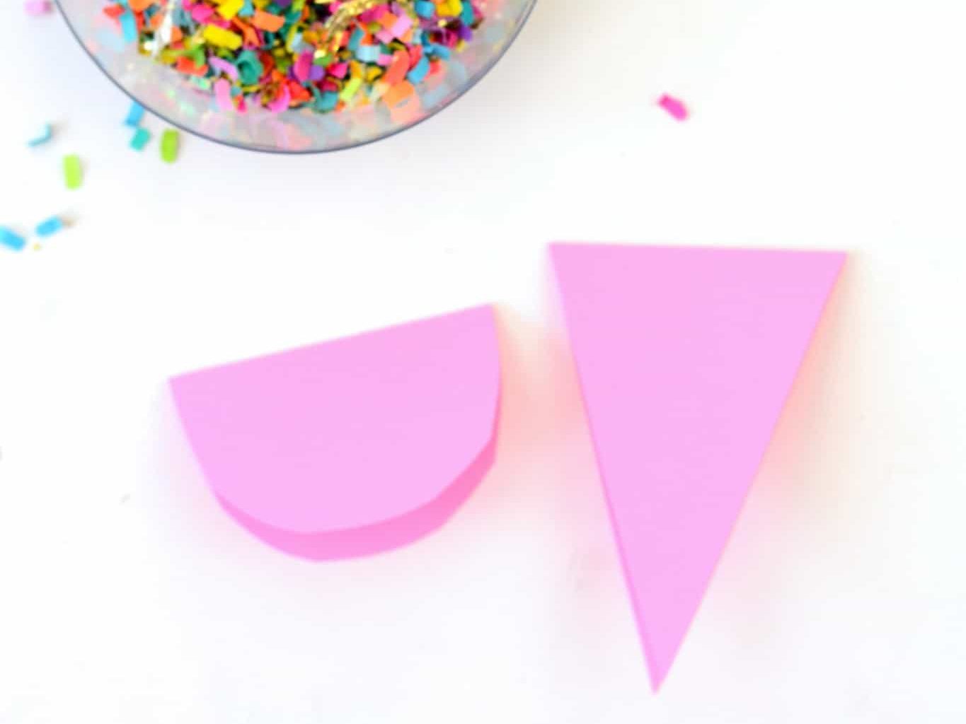 Pink cardstock pieces cut into different shapes
