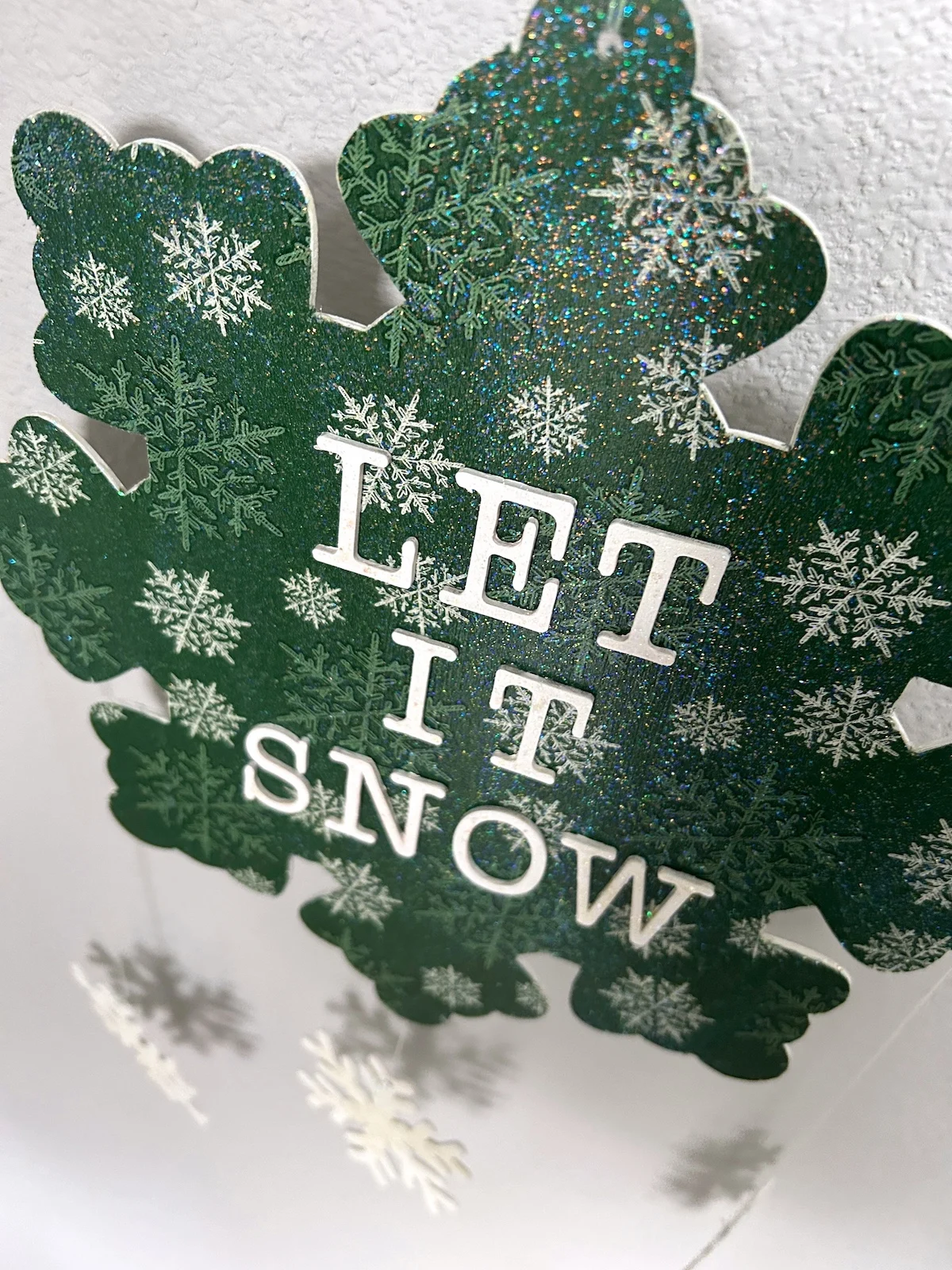 let it snow wood sign with dollar store supplies
