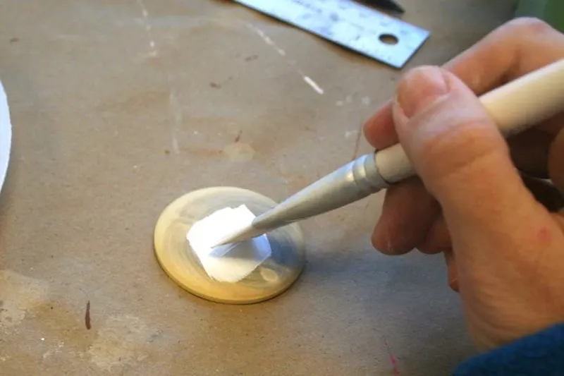 Painting a wood pendant with white craft paint
