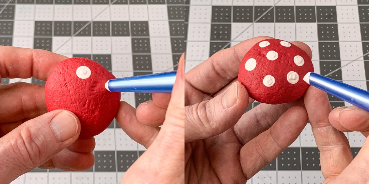 Use a paintbrush to add dots to the top of the mushroom cap