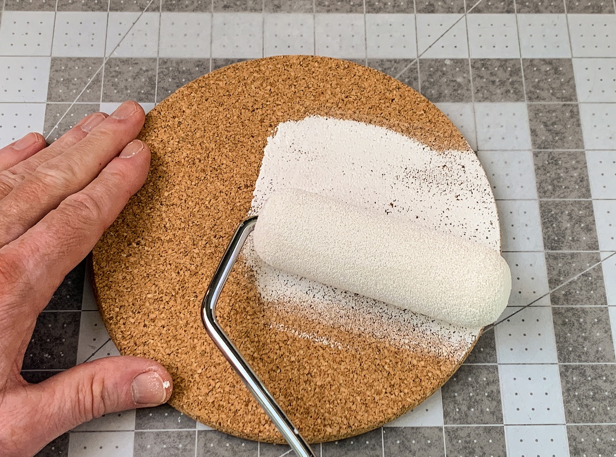 Painting the cork with two layers of white paint