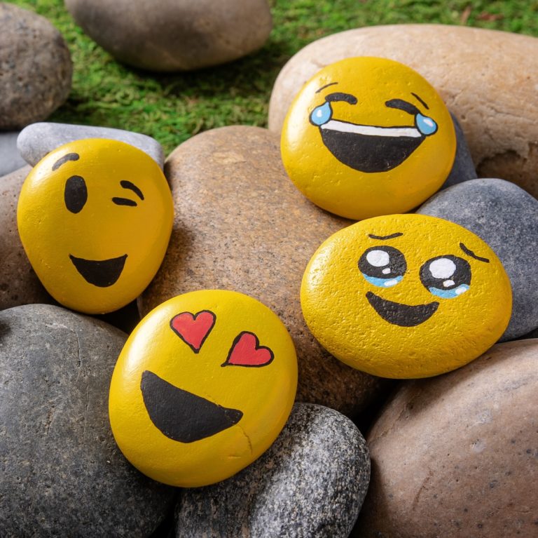 painted rocks like emojis