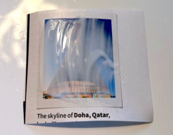 applying Mod Podge to the magazine photo