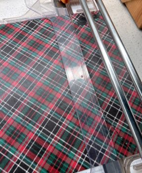 cutting paper with a paper cutter